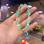Cat head bracelet (green) bagged