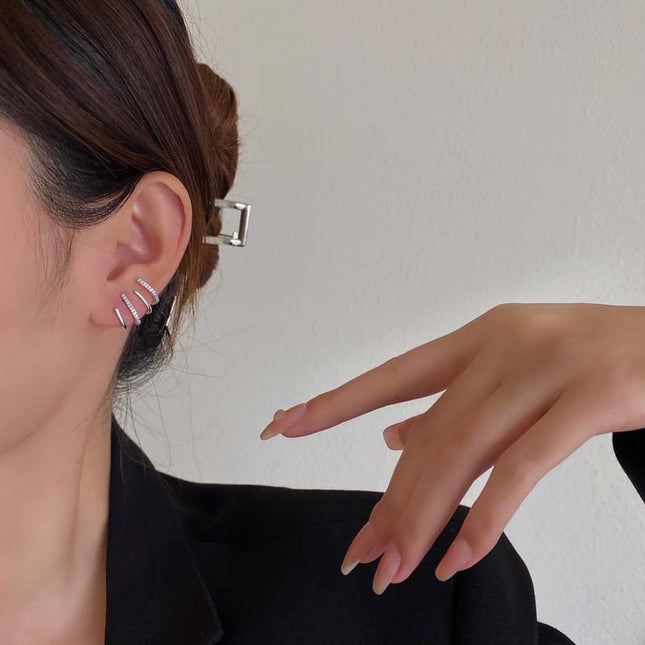 European and American fashion retro zircon four-claw earrings high-grade temperament simple zircon female silver pin earrings flash earrings