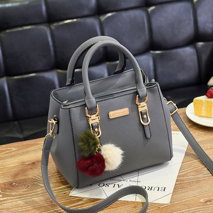 Small square bag ladies handbag simple shoulder bag large capacity bag double fur ball messenger bag wholesale cross-border