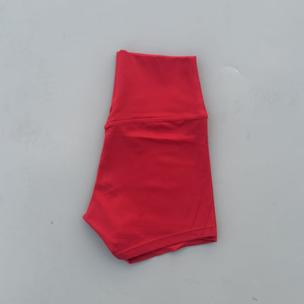 Summer solid color European and American women's high waist hip lifting peach sports shorts tight stretch fitness three pants can be worn outside