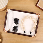 Off-white empty plate with golden rounded corners