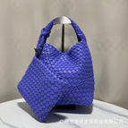 Periwinkle blue-purple woven mini bag with leather shoulder strap