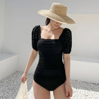 Black one-piece / M