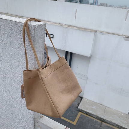 Factory wholesale New Korean version of leather small square bag Joker sheepskin bucket bag niche fashion underarm portable women's bag