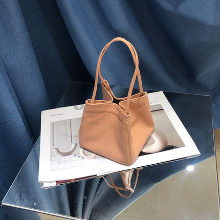 Factory wholesale New Korean version of leather small square bag Joker sheepskin bucket bag niche fashion underarm portable women's bag