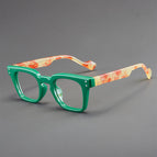 Green framed transparent piece tortoise shell legs