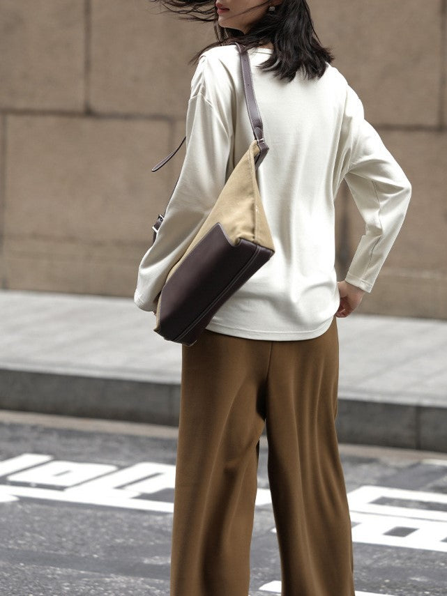 Light oxygen sense sweater 2025 spring temperament round neck oblique split fake placket design long sleeve sweater women