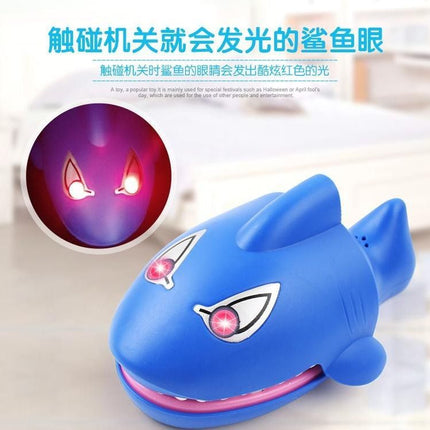 Shark toy press the teeth and mouth will move and bite the soft teeth big white shark trick the whole person new strange children's toy