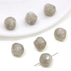 5 p/bag / Irregularly cut beads 12x 12mm aperture about 1mm gray