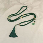 Green tassel necklace can be worn cross-body