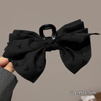 Black flocked bow gripper