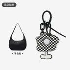 Black and white checkered flower pendant