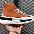 Orange high tops (size runs half a size too large) / 35