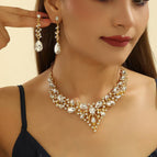 Gold necklace + earrings