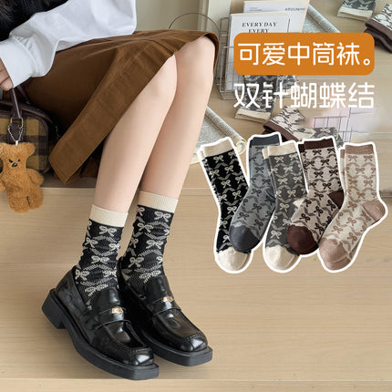 Zhuji socks women's autumn and winter retro trend women's socks bow printed socks warm cold-resistant pile socks wholesale