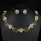18k gold necklace + earrings - needle lake orchid
