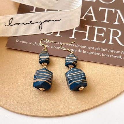 Internet celebrity style retro wooden big eardrops 2023 new trendy personalized fashion mosquito coil ear clip