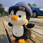 25cm / Travel penguin with blue hat