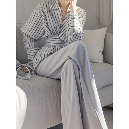 In spring, wear a set of salt-based, light-cooked and capable, elegant, A- and-gray striped shirt, professional suit pants