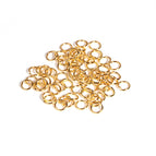 Gold 7*5mm single ring (about 100)