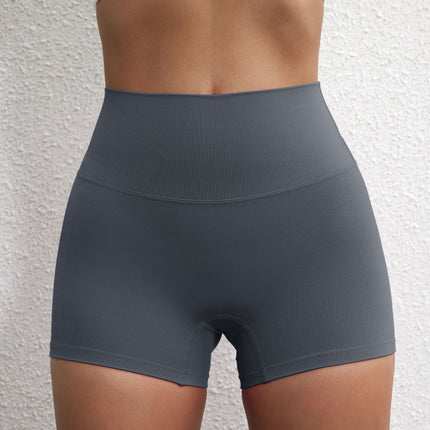 Summer solid color European and American women's high waist hip lifting peach sports shorts tight stretch fitness three pants can be worn outside