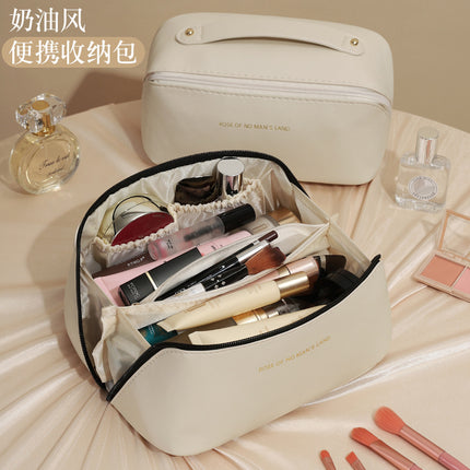 Factory Direct Sales Large-Capacity Storage Bag Pu Leather Satchel Travel Business Trip Portable 2024 New Pillow Cosmetic Bag