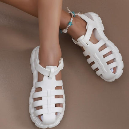 Thick-soled gear sandals women's shoes pig cage shoes covered toe hollow woven muffin Roman sandals plus size ins style sandals
