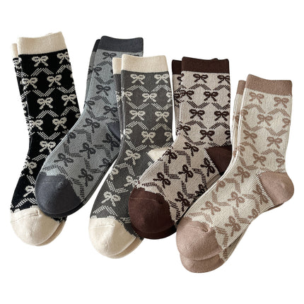 Zhuji socks women's autumn and winter retro trend women's socks bow printed socks warm cold-resistant pile socks wholesale