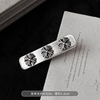 Clip one on the cross edge