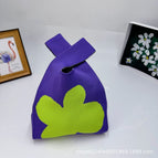 Four-leaf clover purple green