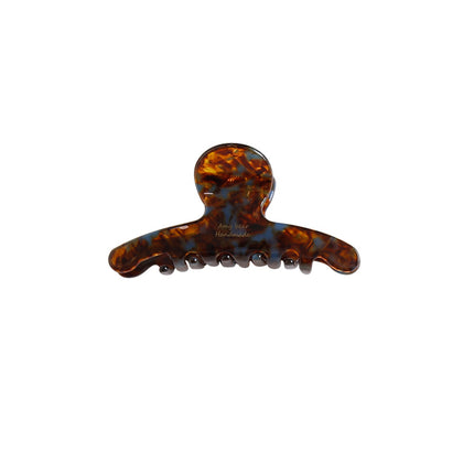 The upgraded version has a small amount of tight hair. chao is easy to use. Advanced acetic acid grip clip. Foreign style shark clip for head