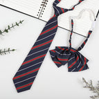 Dark blue and green stripes (tie + collar flower)
