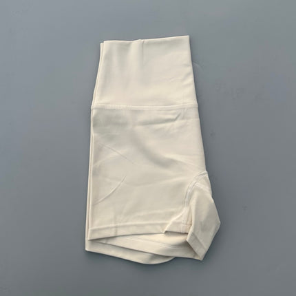 Summer solid color European and American women's high waist hip lifting peach sports shorts tight stretch fitness three pants can be worn outside