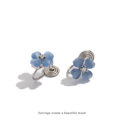 Lucky Blue Four-Leaf Clover Earrings for Women, Exquisite and Compact, Versatile for Daily Use, New Popular Mosquito Coil Disc Ear Clips Without Pierced Ears