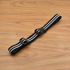 Black and white striped corn grain flow