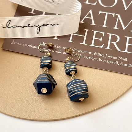 Internet celebrity style retro wooden big eardrops 2023 new trendy personalized fashion mosquito coil ear clip