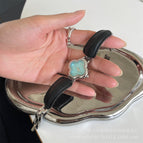 Black with silver frame and blue surface