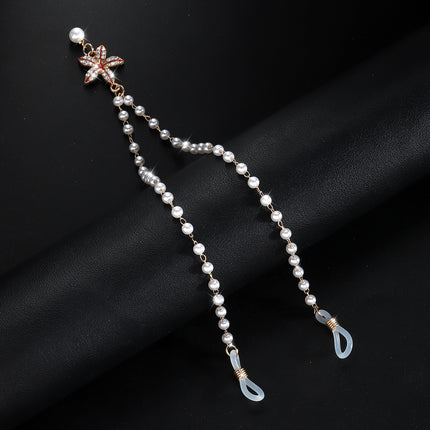 Cross-border hot selling simple pearl tassel double nipple chain flower pendant European and American nightclub disco body chain accessories for women