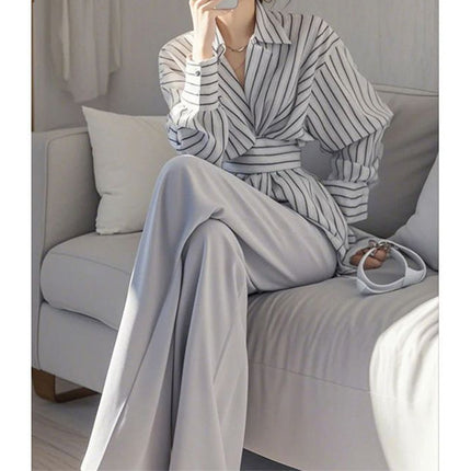 In spring, wear a set of salt-based, light-cooked and capable, elegant, A- and-gray striped shirt, professional suit pants