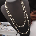 063 white diamond black face four leaf clover