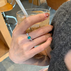 Blue zircon ring-small diamond version