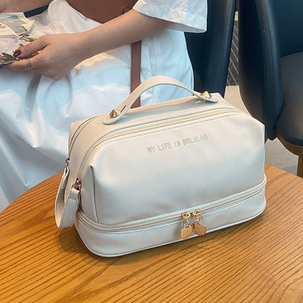 2025 New Pu Leather Portable Cosmetic Bag Large Capacity Divider Skin Care Product Storage Bag Casual Waterproof Toiletry Bag