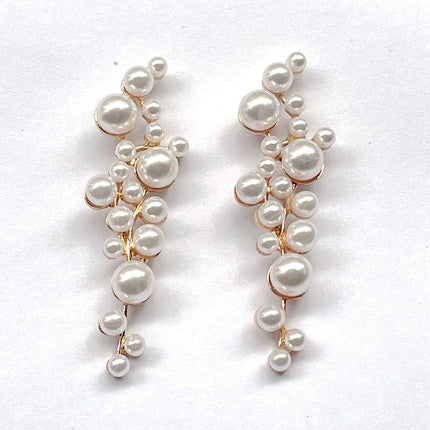 Europe and the United States cross-border trade imitation pearl earrings alloy geometric diamond pearl personality Joker accessories wholesale earrings
