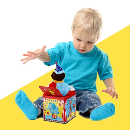 Jack in the Box Classic Children's Musical Toy Colorful Embossed Tin Box and Friendly Plush Age 18 months and Up
