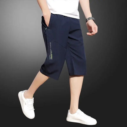2025 New Men's Seven point Ice Silk Zipper Pocket Casual Pants Breathable Elastic Fabric Slimming Version Summer Outdoor Vacatio