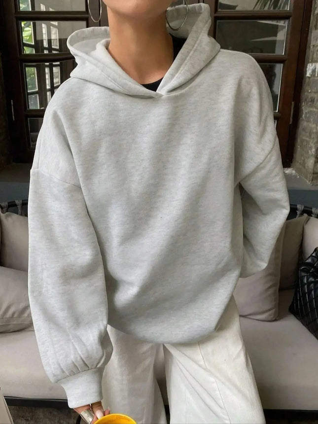 Women's Solid-Color Hooded Casual Sweatshirt with Warm Lining and Relaxed Fit