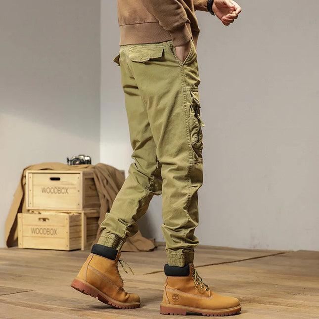 The new men's American retro sporty design in 2025 features multi-pocket, versatile drawstring work pants and stretch trousers