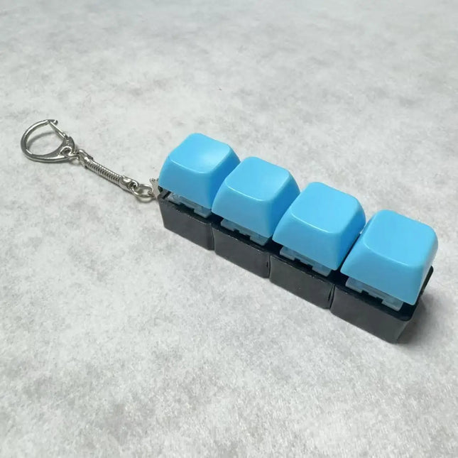 New Stress Anxiety Relief Keyboard Keychain Four Finger Button for Office Home Adults Kid Decompression Clicker Hot Gadget Gifts