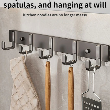 Hooks for hanging clothes at the entrance door, hanging hangers on the wall, and strong hooks for the wardrobe in th