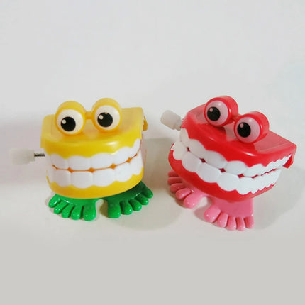 1pcs Clockwork Toy Upper Chain Jumping Tooth Toy Jump Teeth Running Clockwork Spring Wind Up Toy